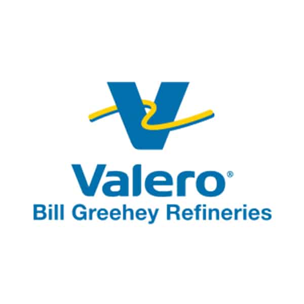 Valero logo featuring a blue V with a yellow curved line crossing it, and the text Valero Bill Greehey Refineries in blue below the logo on a white background.